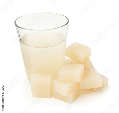 Canvastavla Homemade agar-agar jelly cubes and glass with liquid isolated on white