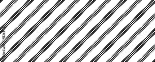 Seamless pattern of black and white diagonal railroad tracks with sleepers on a white background