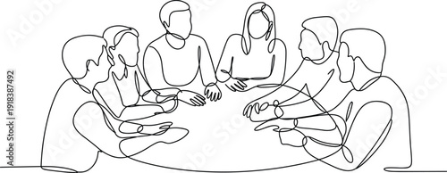 Group of people sitting around a table having a discussion with hands gesturing and interacting
