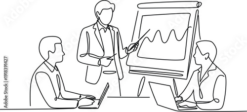 Three people in business attire discussing a graph on a flip chart with two individuals using laptops