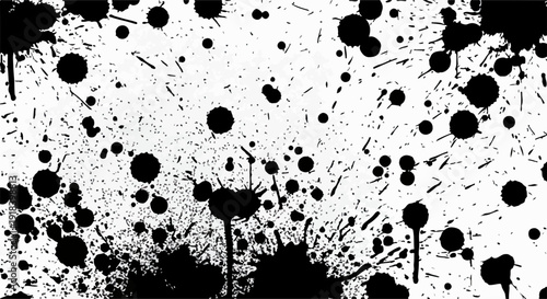 白い背景に飛び散った黒いインクのしぶきと滴が、抽象的でダイナミックなテクスチャを形成し、アートやデザインのプロジェクトに最適なグランジ効果を生み出しています。