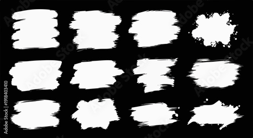 Ensemble de coups de pinceau blancs sur fond noir, parfaits pour le design graphique.