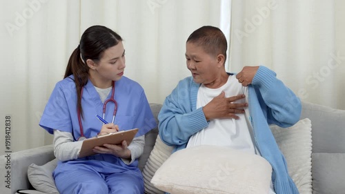 Female, nurse and tablet with senior patient for living assistance or healthcare in retirement home. Female, caregiver and listening to client with technology for elderly care in old age house.