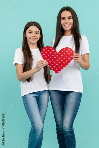 Celebrate love with daughter and mother. Family Valentines Day. Heart and love sign. Mom and child with love and happiness. Mom and daughter, loving family. Mothers Day. Love and family, Valentines.
