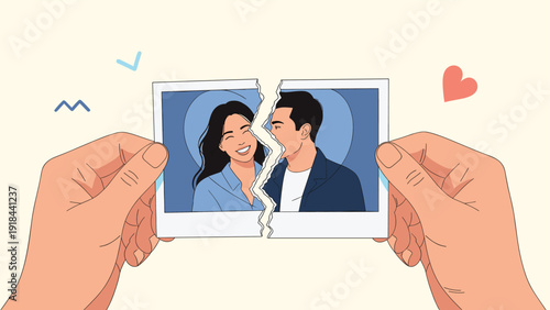 Hands holding a ripped photograph of a once happy couple, symbolizing a painful breakup, divorce, or end of relationship.
