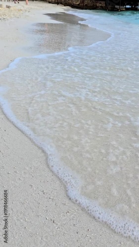 Summer sandy beach Amazing sea clear blue sky and white clouds Wave crashing on sandy shore empty beach 
