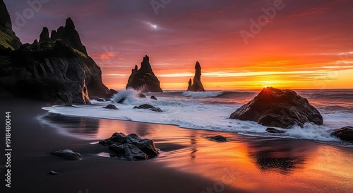 Dramatic volcanic rock formations on a serene beach at vibrant sunset with orange purple sky and waves