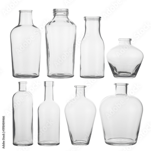 Clear glass bottles in various shapes and sizes empty isolated on a transparent background