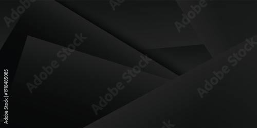 Abstract dark geometric shapes with shadows and light.