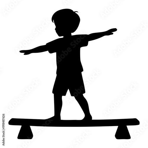 silhouette of a child playing on a balance beam