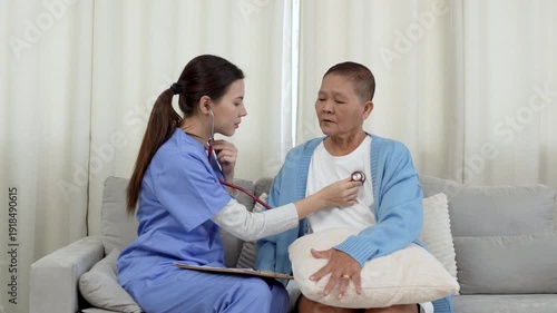 Female, nurse and tablet with senior patient for living assistance or healthcare in retirement home. Female, caregiver and listening to client with technology for elderly care in old age house.