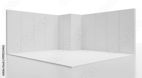 Empty white exhibition booth with two walls forming a corner, ready for a trade show display.