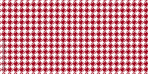 Bold red and white houndstooth seamless pattern. Iconic geometric textile background for statement fashion, holiday decor, and classic branding. High-resolution abstract texture.