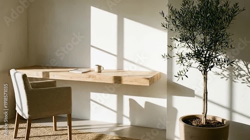 Modern home office with desk with chair, olive tree, and and natural sunlight.