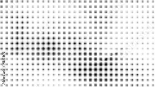 Abstract monochrome dot pattern with scattered gradient elements
