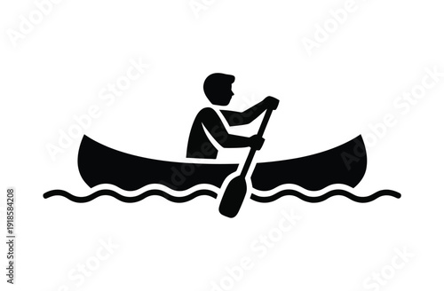 A simple black and white silhouette icon depicting a person paddling a canoe on water, representing outdoor recreation and water sports.
