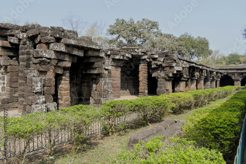Canvastavla ​a perspective view of the outer circular corridor at kurumbera fort, showcasing