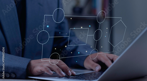 Businessman typing on laptop with virtual flowchart diagram. Concept of workflow automation, algorithm design, and business process strategy.Workflow Business Solution Outline