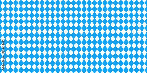 A vibrant pattern of blue and white diamonds covering the entire frame