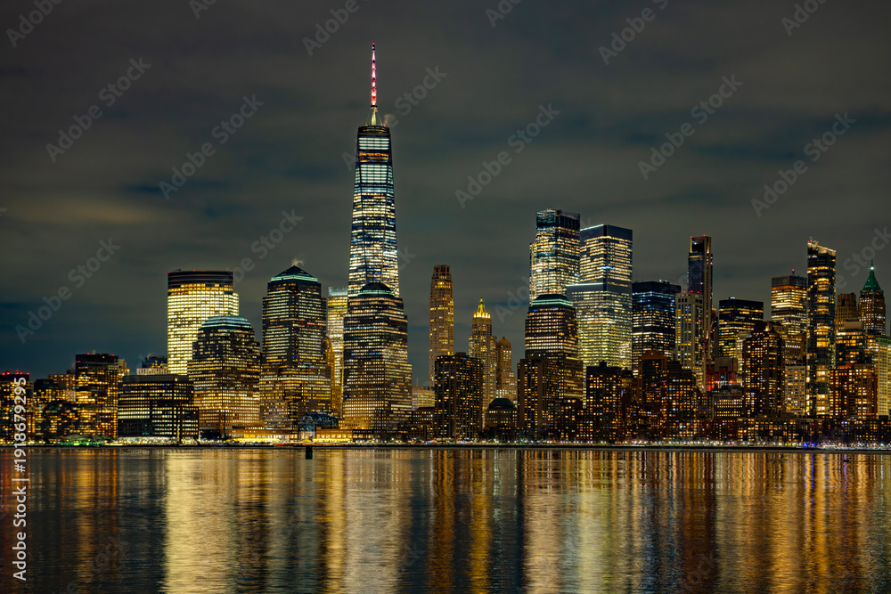 Obraz premium New York Manhattan cityscape at night. New York City view at night. New York skyline cityscape at night. New York iconic panorama at night.