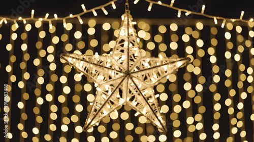 Decorative Light-Up Star Ornament Hanging with Warm White Christmas Lights Backdrop