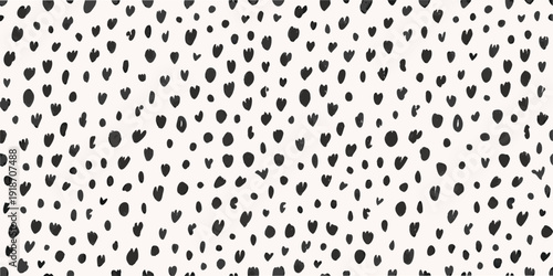 Abstract pattern of scattered black brushstrokes on a white background