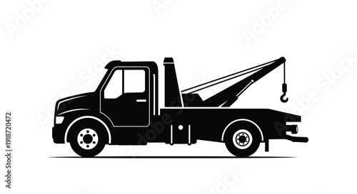 A black silhouette of a tow truck with an extended lifting arm
