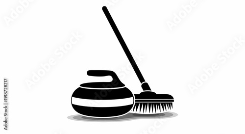 Curling stone and broom standing ready on ice rink surface from a high viewpoint