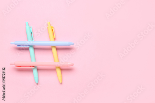 Hashtag made of pens on pin...