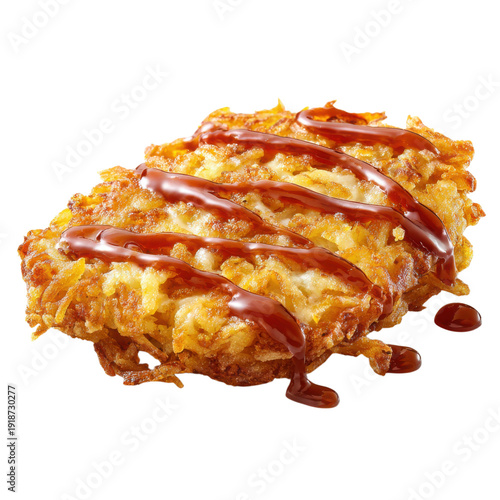 A delicious fried food with ketchup drizzled on top