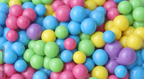 A colorful collection of round bubble gum candies in various bright colors filling the frame