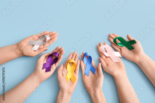 Many female hands with diff...