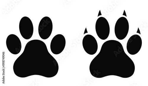 Black silhouette dog paw prints including one with claws extended