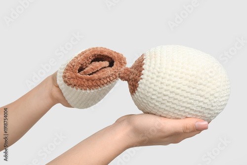 Female hands with knitted m...