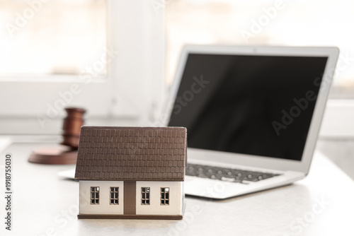 House model on table in roo...