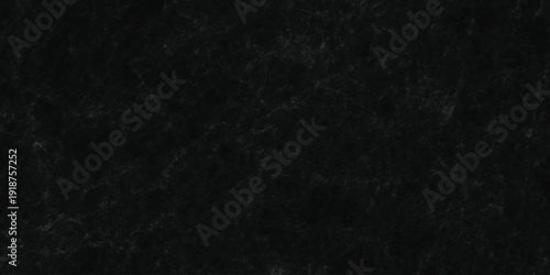 Dark charcoal grunge wall texture background. Dark black rough grunge surface with smoke edge. Black texture chalk board and black board.