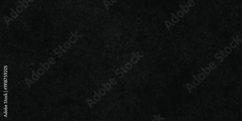 Dark charcoal grunge wall texture background. Dark black rough grunge surface with smoke edge. Black texture chalk board and black board.