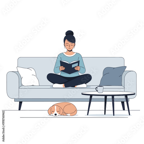 Woman Reading Book on Sofa with Sleeping Dog on Floor