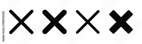 Collection of four black cross symbols or X marks on white background