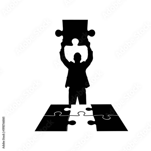 Businessman holding puzzle piece above head.