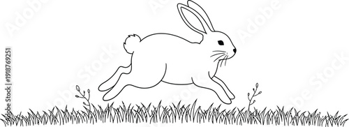 Simple black and white line drawing illustration depicts a quick white rabbit hopping swiftly across a patch of grassy field area.