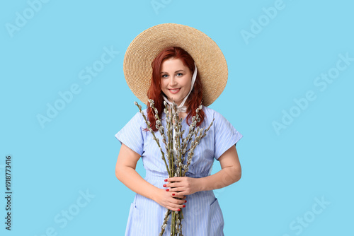 Happy young woman with puss...