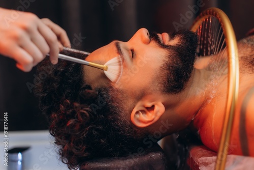 Obraz na płótnie Man receiving professional facial spa treatment