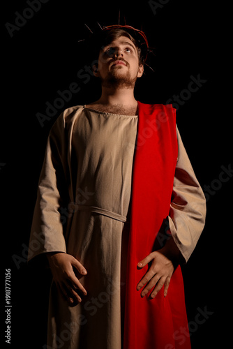 Man in Jesus robe and crown...