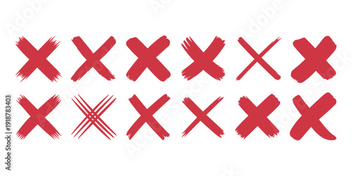 Red brush stroke x marks on white background