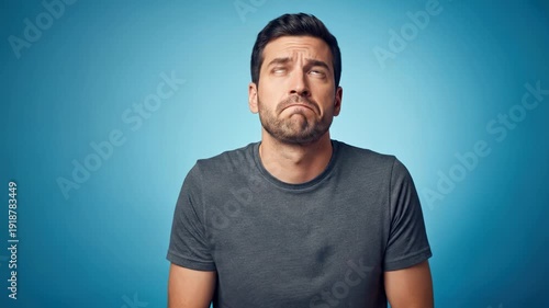 Man Shrugging with Confused Expression, Showing Uncertainty and Doubt