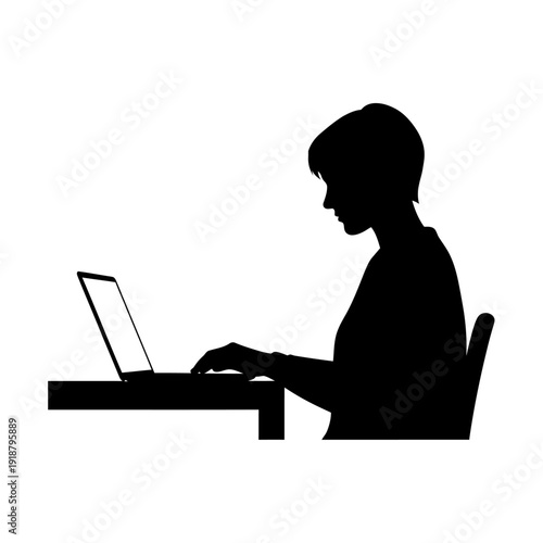 Silhouette of a man using laptop.