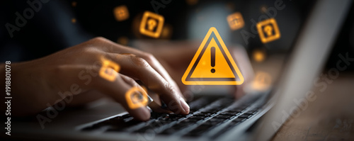 Cyber security warning icon alert on laptop data risk online protection concept shows digital safety concern