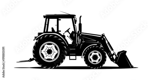 A black silhouette of a tractor with a front loader is parked outdoors.