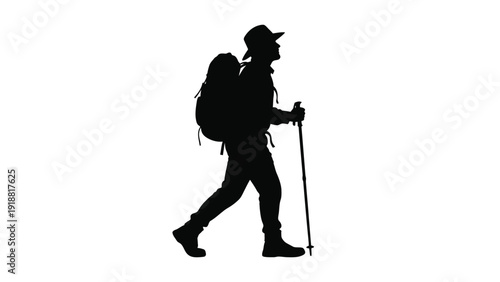 Silhouette of a determined hiker wearing a wide brim hat and carrying a large backpack while using a trekking pole for support on a journey